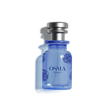 Osma Citrus F perfume bottle on a white background
